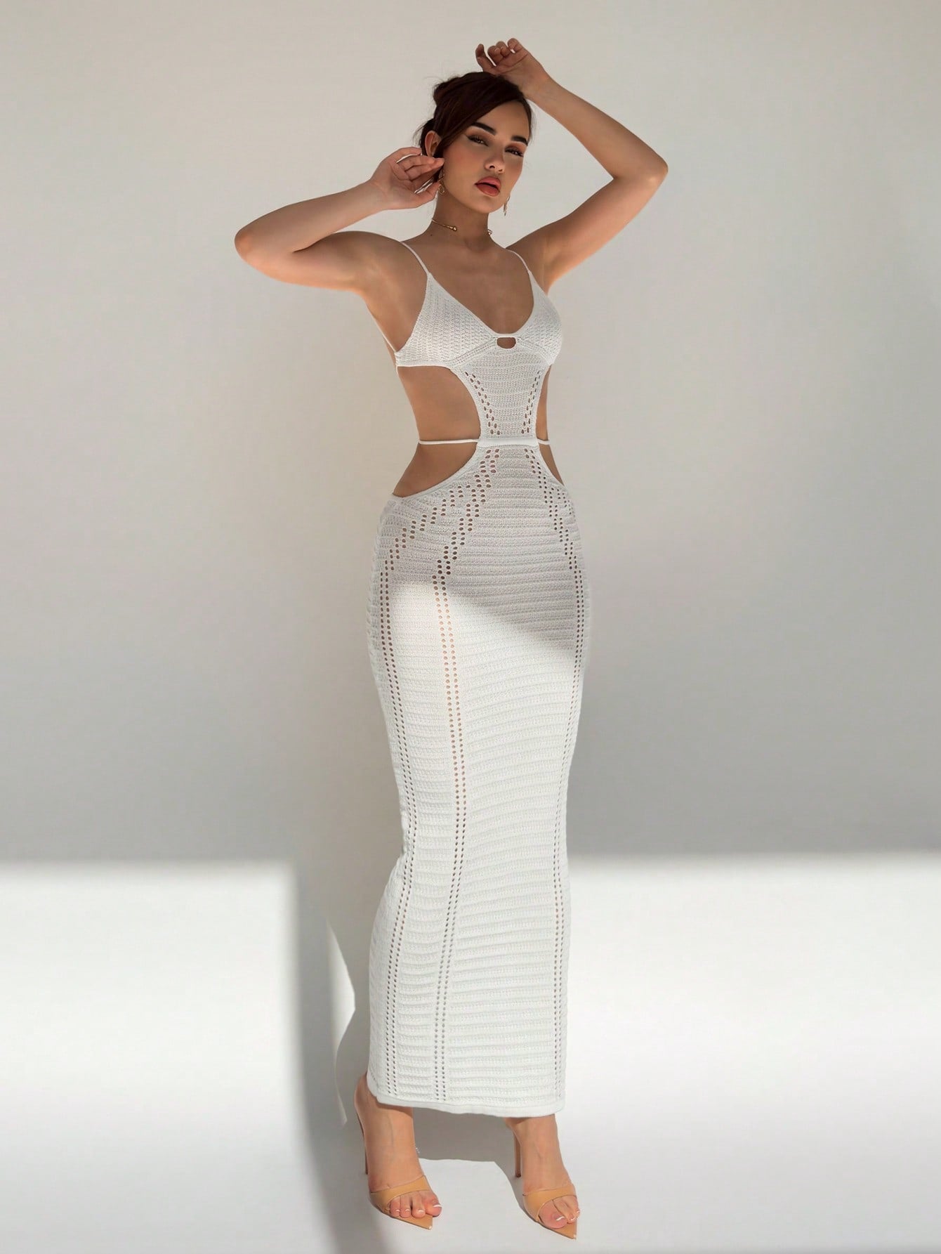 Sleeveless Knitted Slim Fit Sweater Dress with U-Neck and Hollow-Out Detail for Casual Wear