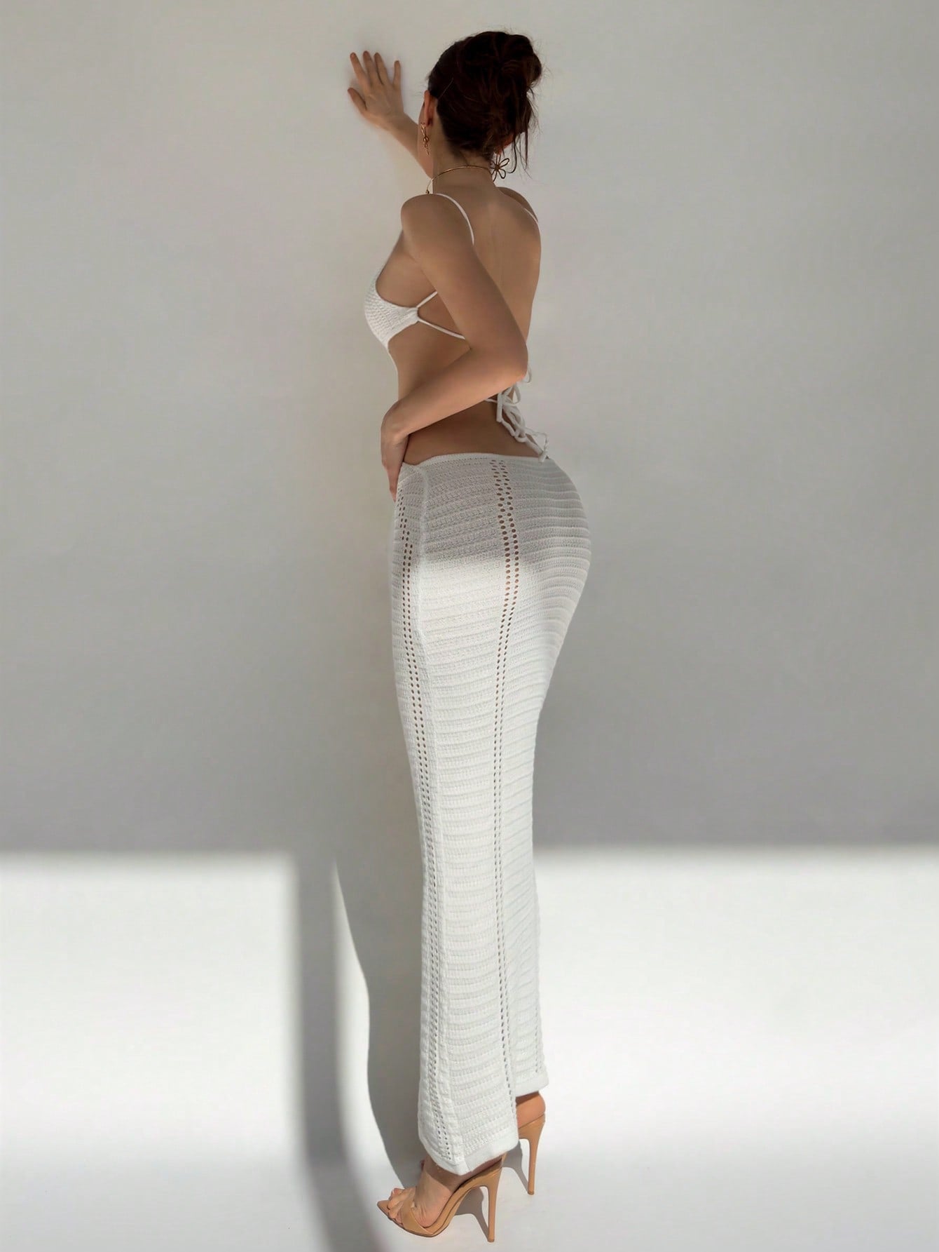 Sleeveless Knitted Slim Fit Sweater Dress with U-Neck and Hollow-Out Detail for Casual Wear