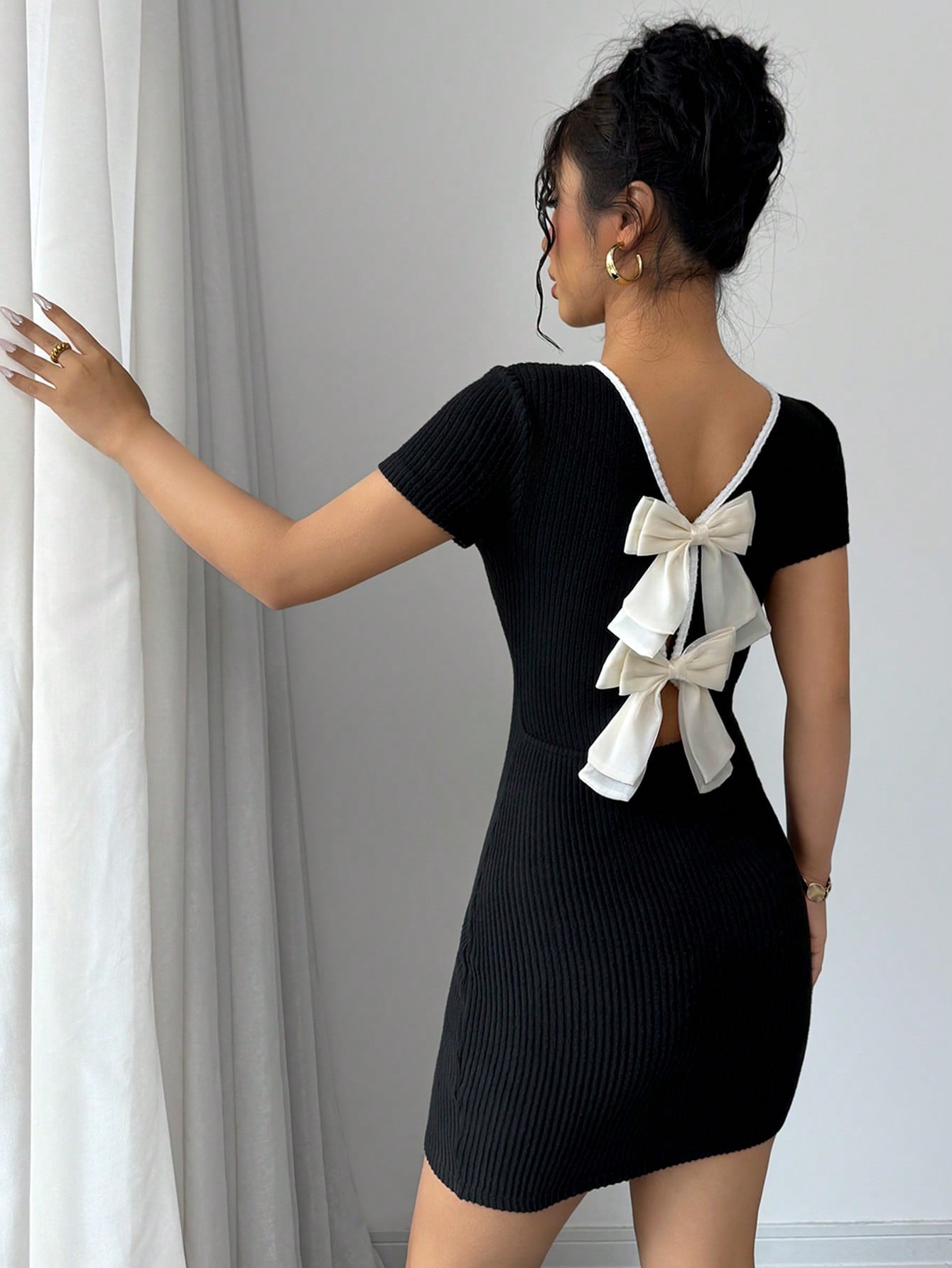 French Style Short Sleeve Mini Dress with Tie Back Detail and Clean Design for Everyday Wear