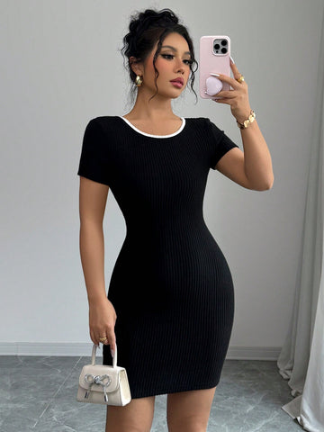 French Style Short Sleeve Mini Dress with Tie Back Detail and Clean Design for Everyday Wear