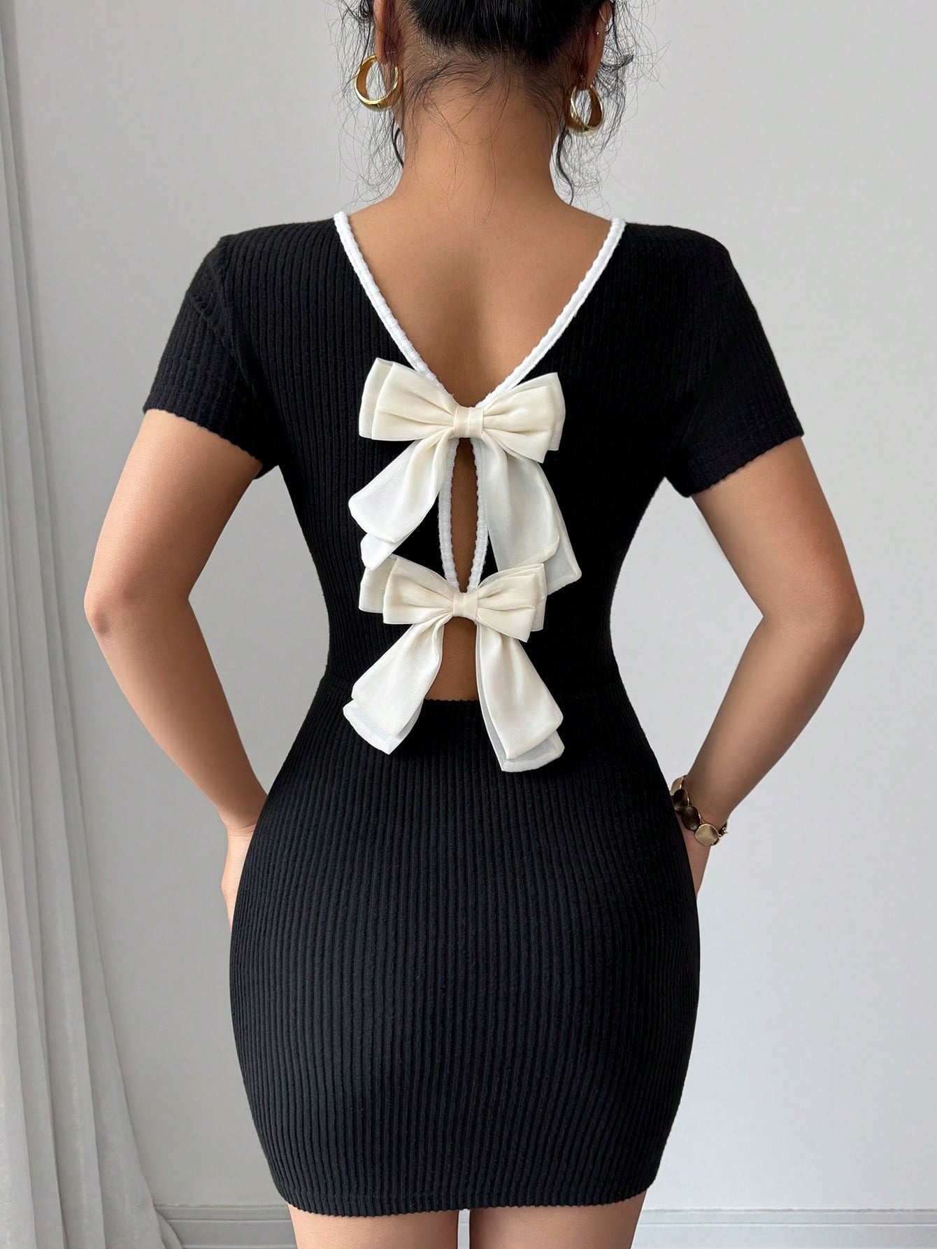 French Style Short Sleeve Mini Dress with Tie Back Detail and Clean Design for Everyday Wear